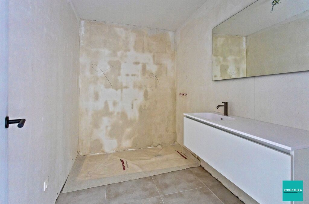 Gelijkvloers appartement te koop in MERCHTEM