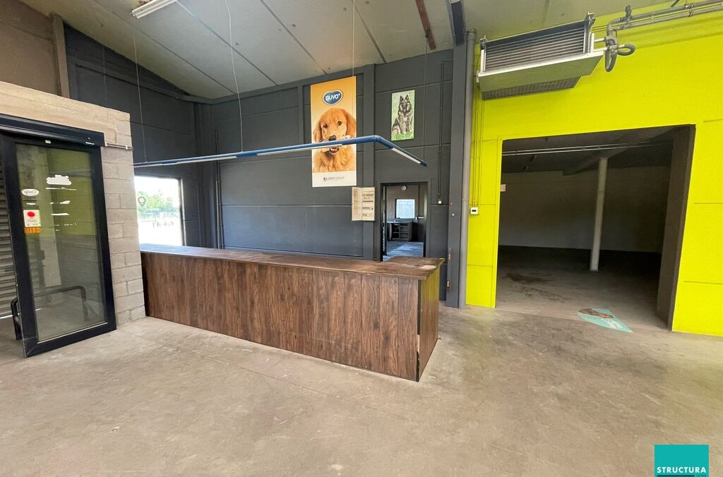Woning met loods te koop in MERCHTEM
