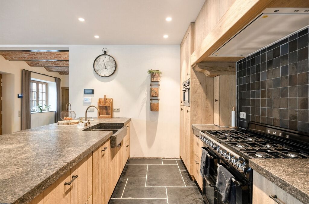 Woning met loods te koop in MERCHTEM