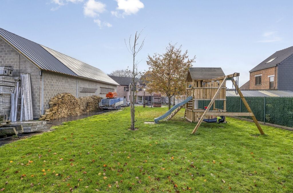 Woning met loods te koop in MERCHTEM