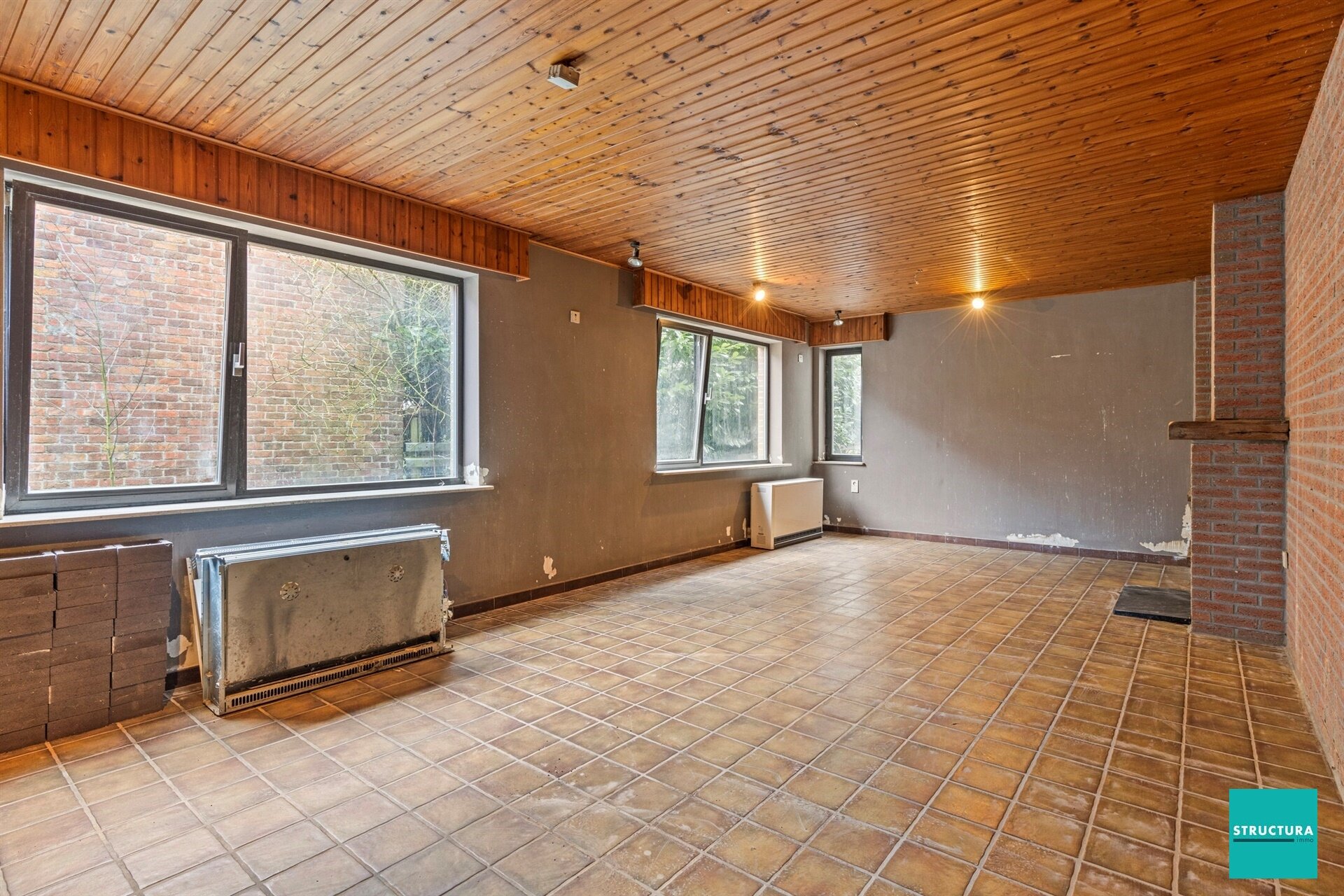 Woning met loods te koop in MERCHTEM